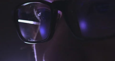 4K Video Close up macro asian eye with eyeglass with coding reflection. Conce Video stock 170026038