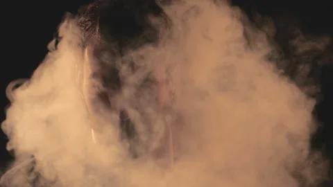4k video of close up man appearing in a smoke. Stock-Footage 159849602