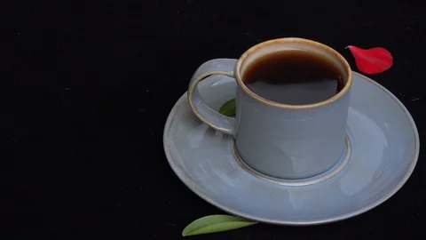 4k video Close up stir or stirring a blue coffee cup with a spoon Stock Footage 115068304