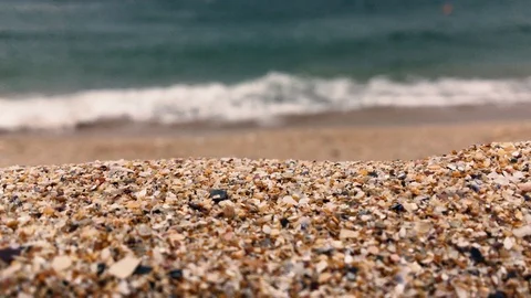 4k video Close up view of sand and blurred or blur sea waves crushing Stock Footage 115069382