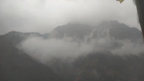 4K Video of clouds in hills. 스톡 동영상 331700606