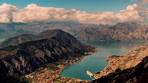 4k video of clouds mountains and lake time lapse Видео 164439005