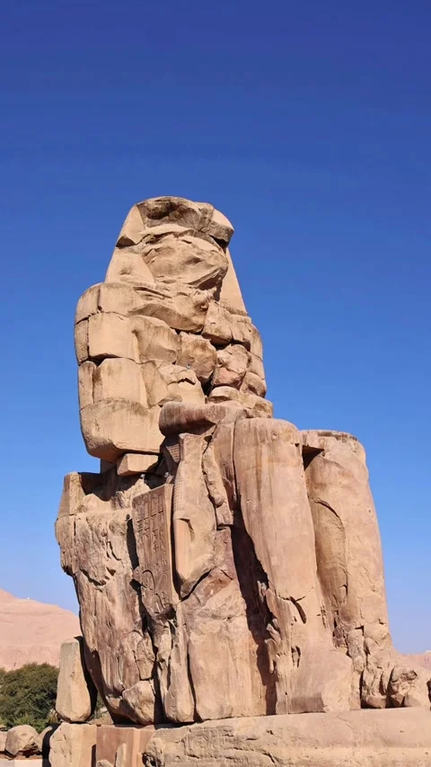 4K video of the Colossi of Memnon, a massive ancient Egyptian stone statue Stock Footage 335030287