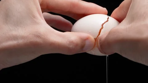 4K Video of cracking an egg. Stock Footage 266498554
