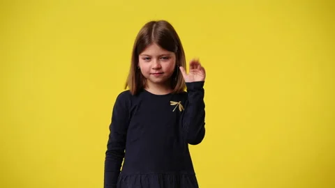 4k video of cute girl smiling over yellow background. Stock Footage 238038053