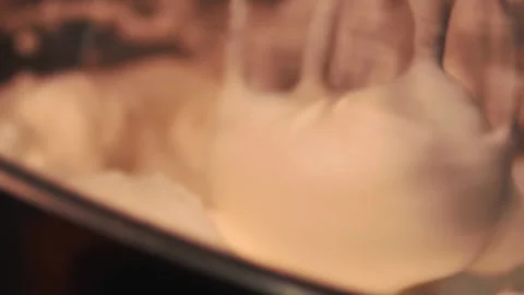4k video detail beating egg white with an electric mixer. Stock Footage 262655461