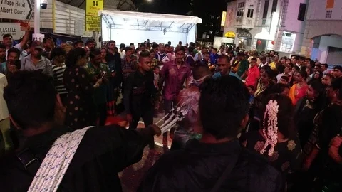 4K video of devotee dancing and pulling a chariot at Thaipusam procession Stock Footage 124525187