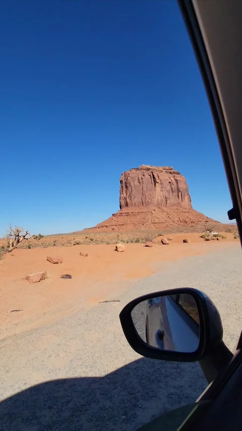 4K video of driving through Monument Valley in Arizona in a rental SUV 스톡 동영상 306653692