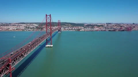 4K video from drone to The 25 de Abril Suspension Bridge in Lisbon Stock Footage 261906135