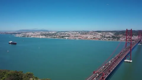 4K video from drone to The 25 de Abril Suspension Bridge in Lisbon Stock Footage 261906252