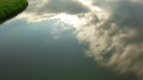 4k video drone flight over the lake, small waves on the water Stock Footage 197387005