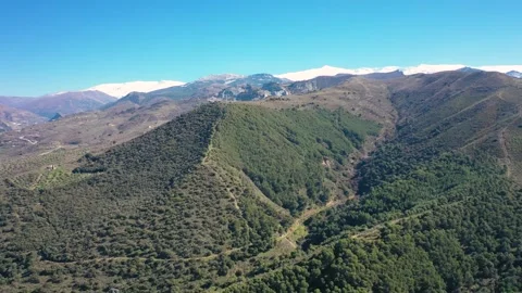 4K video from a drone of the snow-capped mountains of the Sierra Nevada Stock Footage 329807203