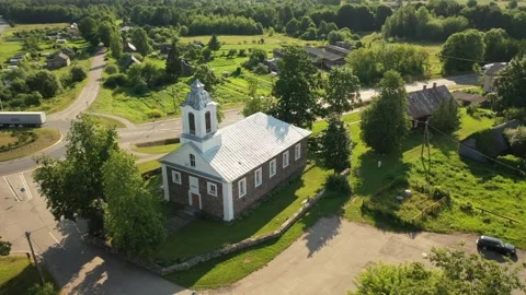 4K video from drone to Svente Most Holy Trinity Roman Catholic Church.Latvia Stock Footage 244645900