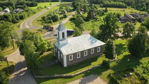 4K video from drone to Svente Most Holy Trinity Roman Catholic Church.Latvia Stock Footage 244646011