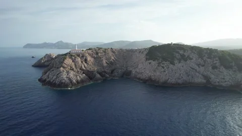 4k video drone view. Lighthouse structure near the coast, Capdepera, Mallorca Stock Footage 254709864