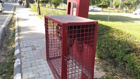 4k Video of fire extinguisher installed near road. Stock Footage 300192568