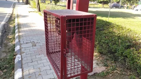 4k Video of fire extinguisher installed near road. Stock Footage 300192577