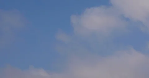 4k video of floating clouds across the sky Stock Footage 129090816