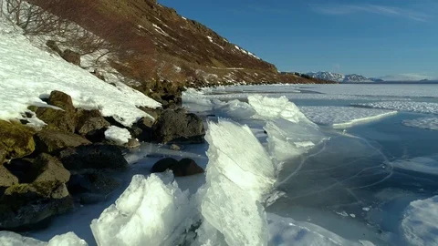 4k video flying low over ice formations on a frozen lake 1 Stock Footage 87062946