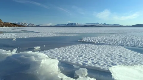 4k video flying low over ice formations on a frozen lake 2 Stock Footage 87062949