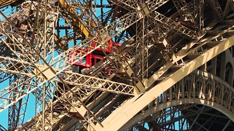 4K video footage of ascending Eiffel tower red lift in Paris Stock Footage 282915817