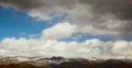 4K Video format - The end of a winter storm passes over snow capped mountains 4k or 4k+ Resolution