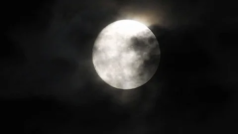4k video full moon real time in the sky. Clouds passing by moon at night Stock Footage 120357331