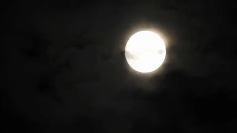 4k video full moon in the sky. Full moon at night with clouds 스톡 동영상 120357573