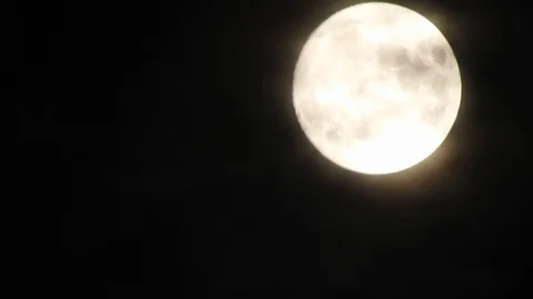 4k video full moon in the sky. Full moon at night with clouds 스톡 동영상 120357682
