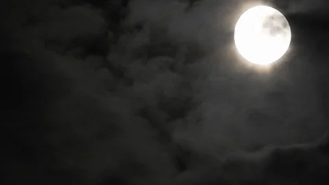4k video full moon in the sky. Full moon at night with clouds 스톡 동영상 120358035