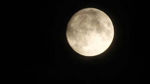 4k video full moon in the sky. Full moon at night with clouds Stock Footage 120358232