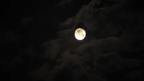 4k video full moon in the sky. Full moon at night with clouds 스톡 동영상 120358536