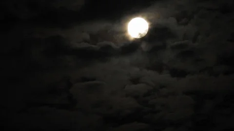 4k video full moon in the sky. Full moon at night with clouds 스톡 동영상 120358692
