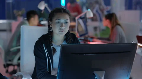 4K Video game development team collaborating in creative office Video stock 67552448