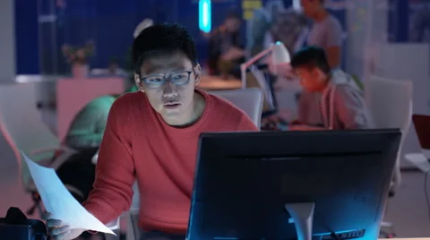 4K Video game development team collaborating in creative office Stock Footage 67554919