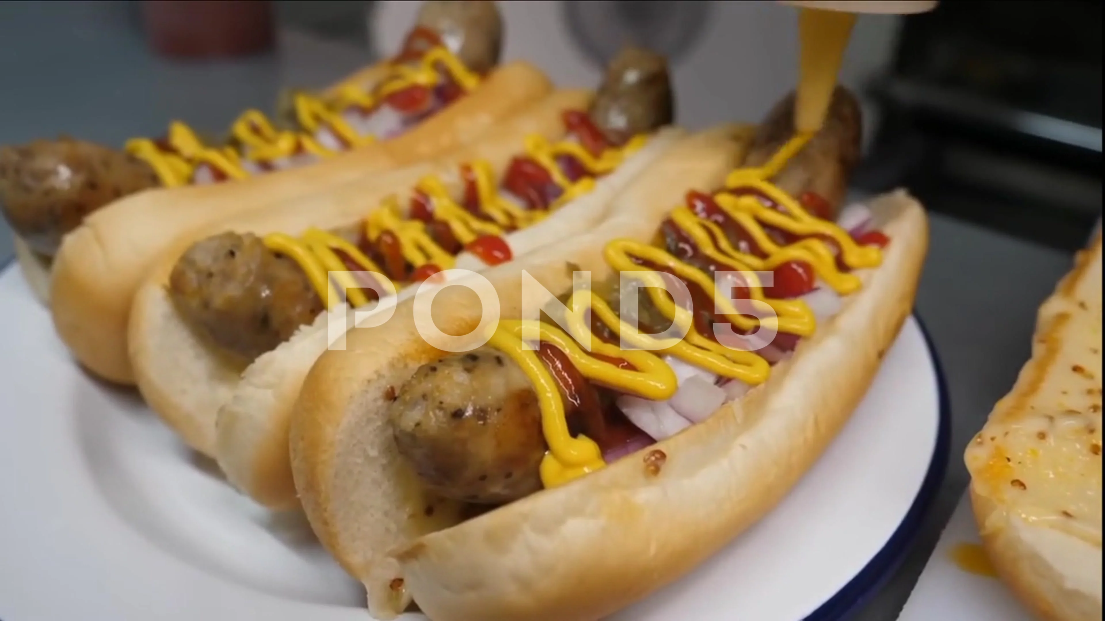 4K video graphy of cooking hot dog.