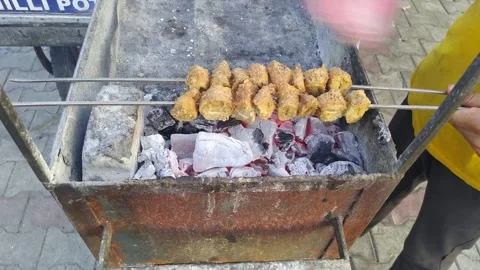 4K Video of grilling indian snack on the charcoal or wood fire. Stock Footage 247455166