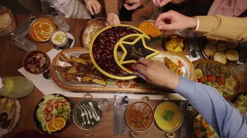 4K Video Group of People Sharing Iftar Meal Break Fast During Ramadan Stock Footage 330423801