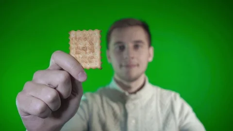 4k video. The guy eats cookies Stock Footage 85335398