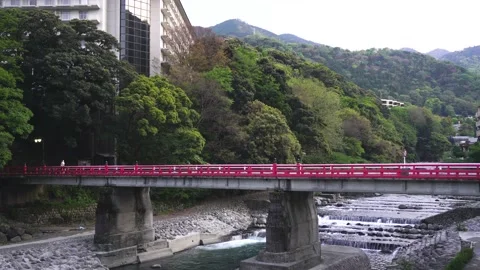 4K Video Hakone , red bridge view and small stream, water fall. Stock Footage 133621400