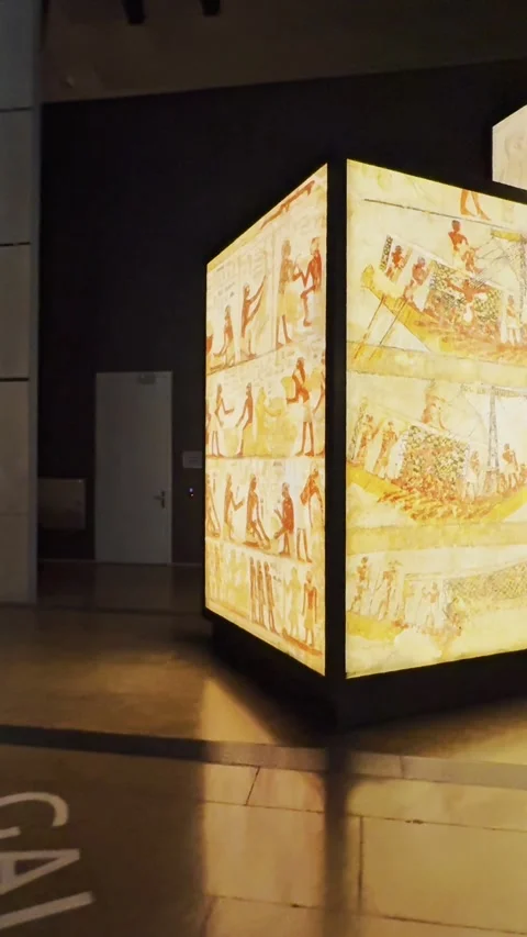 4K video of illuminated ancient Egyptian wall art panels Stock Footage 335030388