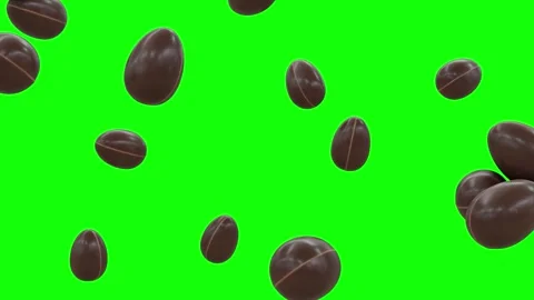 4K video of Kinder Surprise Chocolates Falling on Green Screen With Alpha Matte Stock Footage 327631322