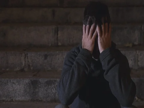 4K video lateral panning 24 fps of young wasted man in stress on street Stock Footage 71722650