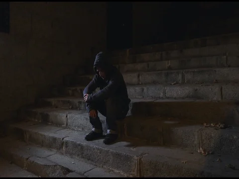 4K video lateral panning 24 fps of young wasted man in stress on street Stock Footage 71725183