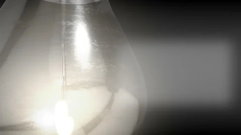 4k video of light bulb icon isolated on dark background. Stock Footage 143083447
