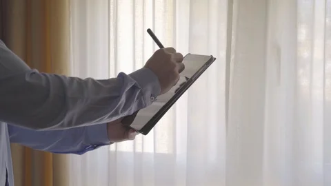 4k video of man using his tablet. Concept of new technologies, communication Stock Footage 129603278