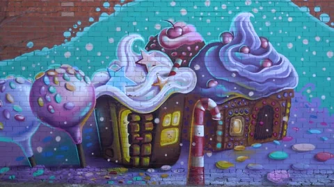 4K video. An old brick wall with patterns and artistic graffiti. Stock Footage 229025480
