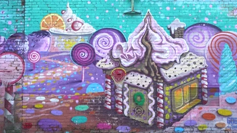 4K video. An old brick wall with patterns and artistic graffiti. Stock Footage 229025490