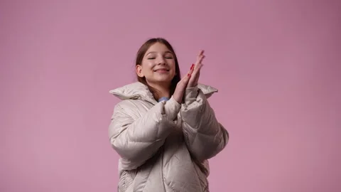 Girl Claps Cheeks Stock Video Footage | Royalty Free Girl Claps Cheeks