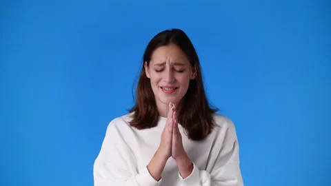 4k video of one girl posing for a video over blue background. Stock Footage 234323751